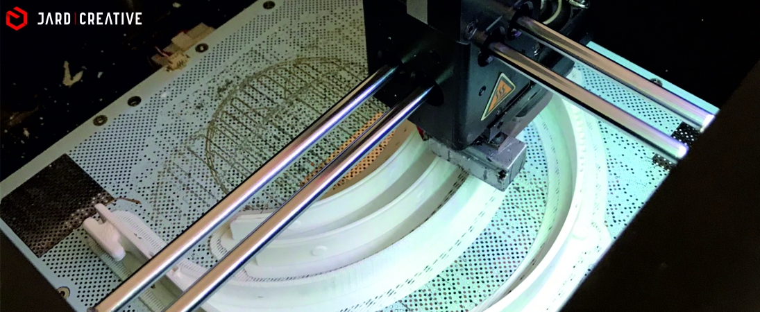 What does the process of printing protective masks look like on a 3D printer?
